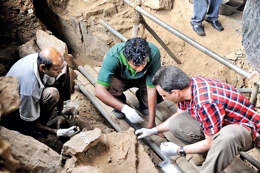 The deep, stratified archaeological excavation pit inside Pahiyangala Cave, where ancient human remains were discovered.